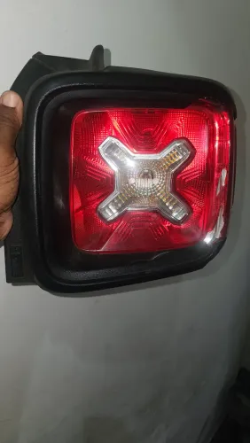 FAROL TRASEIRO JEEP LAD DIREITO 