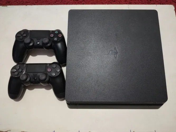Ps4 slim de 1tb, com dois jogos gta 5 e the last of us