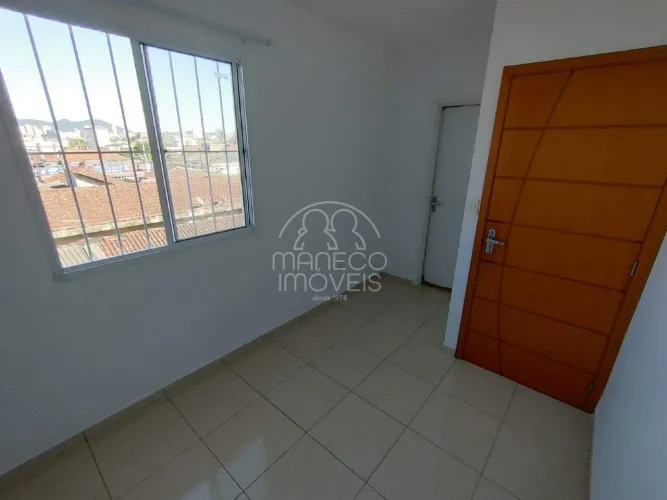 Sala living dividido para locação na Vila São Jorge em São Vicente.