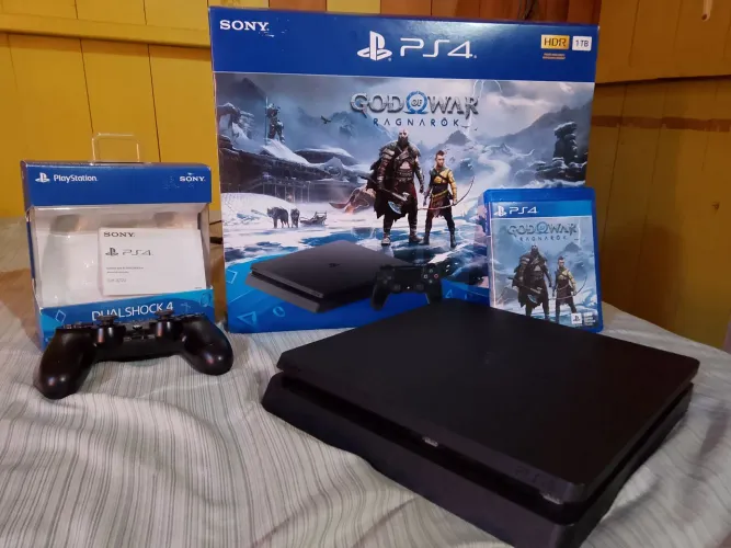 PS4 Slim 1TB completo por 1600