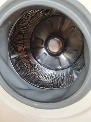 Máquina de lavar de tombamento. 