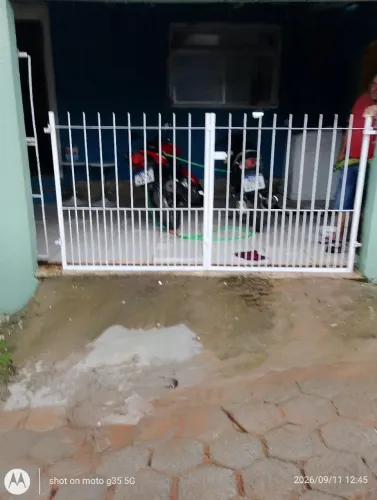 vendo portão de ferro galvanizado usado em estado de novo