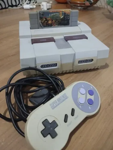 Vendo super nintendo detalhe no conector de carga porém funciona normal