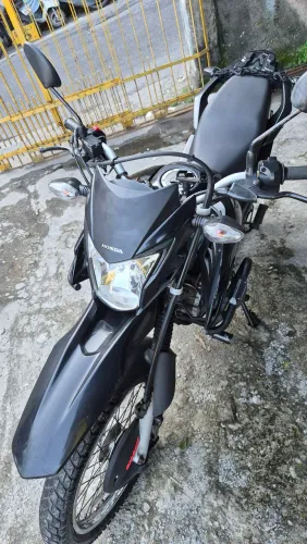 Moto bem conservada único dono , quitada pronta pra rodar