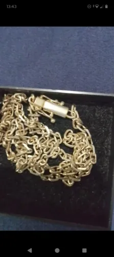 Corrente banhada a ouro não é moeda antiga e nem prata é banhada 