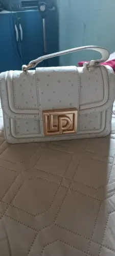 Bolsa lança perfume 