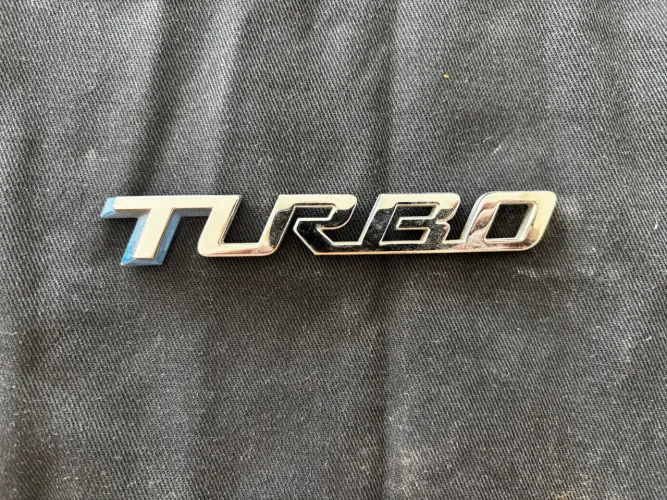Emblema letreiro TURBO - Ônix