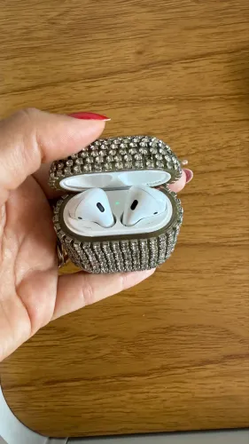 Apple Watch com carregador + AirPods