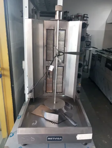 NZ. Máquina de assar carne churrasco grego