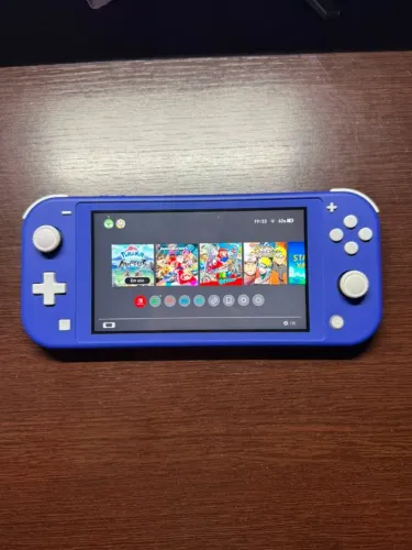 Nintendo Switch Lite + Zelda BOTW