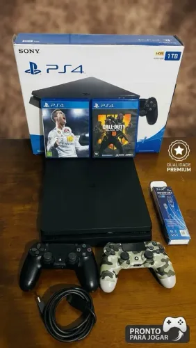 Ps4 1TB estado de loja 02 controles e 02 jogos a caixa 02