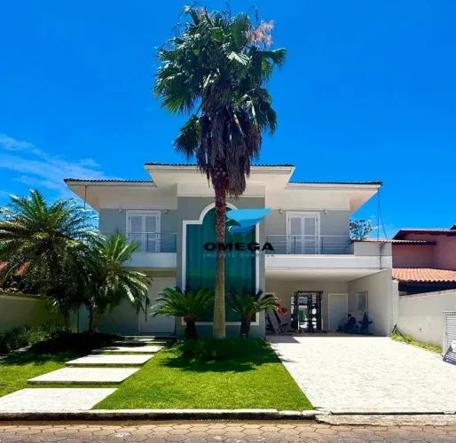 Casa à venda em condomínio Jardim Acapulco no Guarujá I Omega Imoveis
