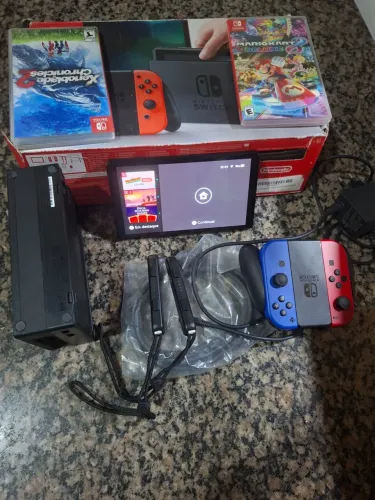 Nitendo switch completo+ 2 jogos (Mário kart deluxe)