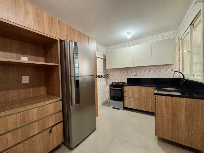 INBOX CIA IMOBILIÁRIA ALUGA EM BENTO GONÇALVES - Apartamento com três quartos e um box de 