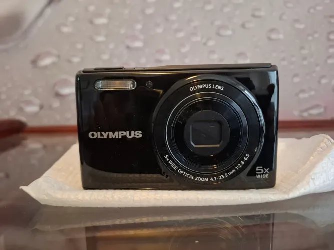 Câmera fotográfica OLYMPUS NA CAIXA.