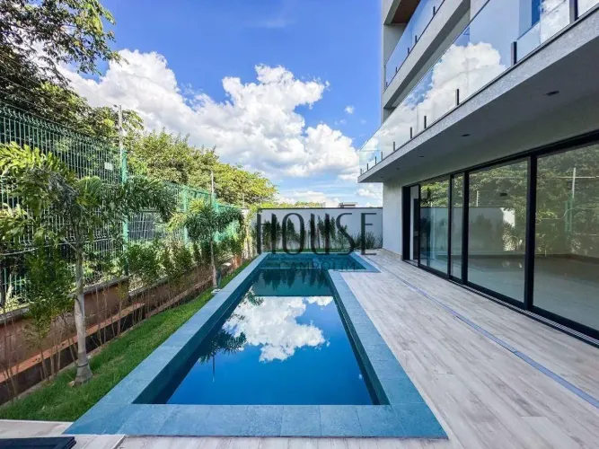 Casa com 4 dormitórios à venda, 404 m² por R$ 4.000.000,00 - Condomínio Alphaville Castell