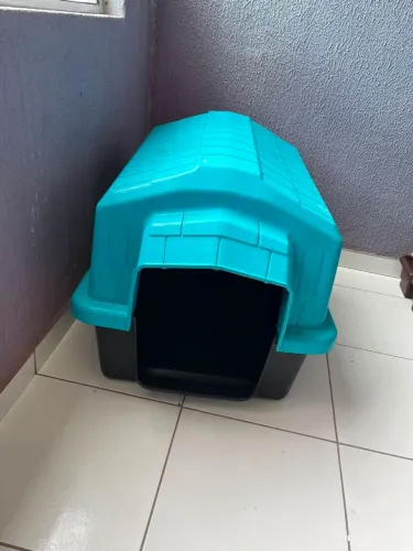 Casinha de cachorro e tapete higiênico