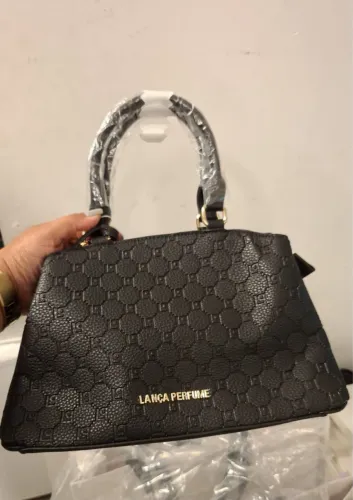 Bolsa lança perfume original nova