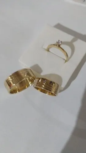 Par aliança moeda antiga e solitário noivado ou casamento