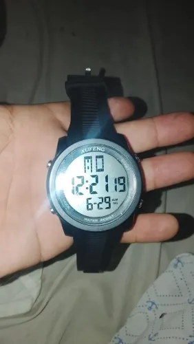 Relógio original com o plástico ainda.