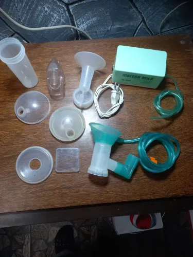 Bomba tirar leite elétrica 110v matern Milk completa usada