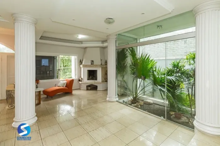 Casa com 5 dormitórios à venda em Parque Santa Fé, Porto Alegre.