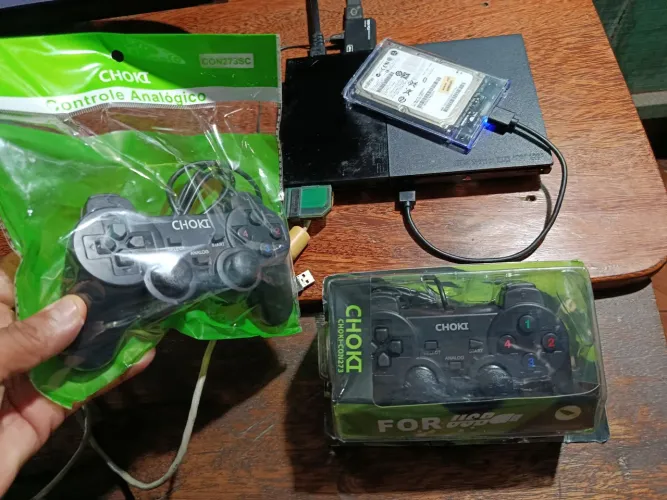 PS2 destravado com 2 controles novos e 63 jogos aceito cartão