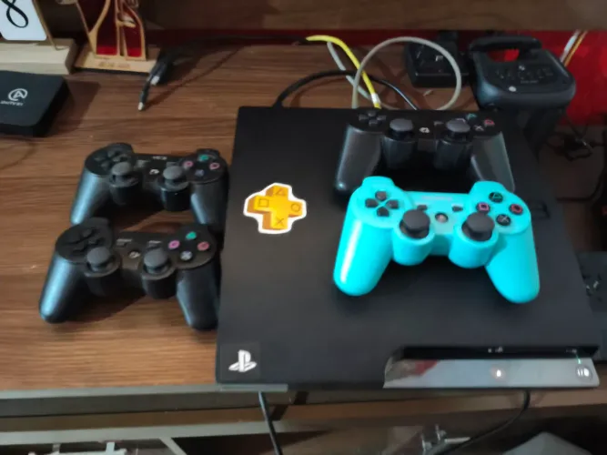 Ps3 slin 512gb SSD lotado jogos ps3 PS2 ps1 4 controles aceito troca Xbox one