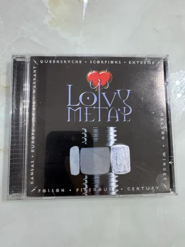 "Lovy Metal - Volume 1", lançada pela gravadora Century. 