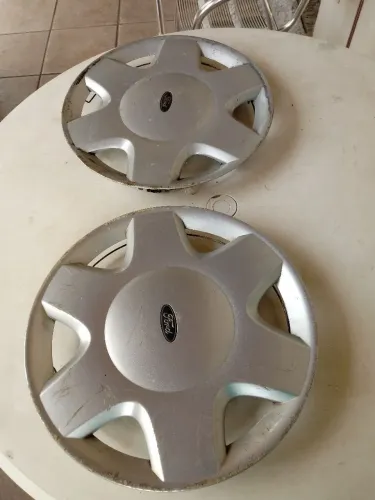 Calotas originais Ford Escort.Tres por.99,00