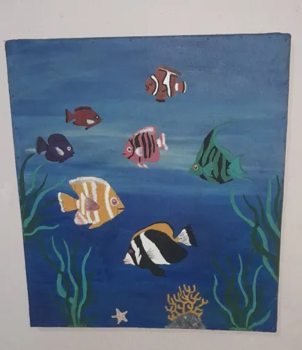 pintura de quadro de peixinhos coloridos.