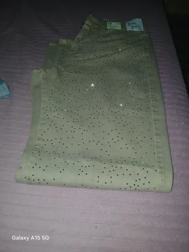 Calça  com stras 