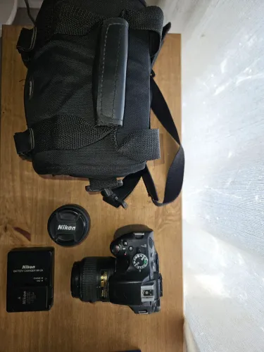 Nikon D5100 + lente 18-55mm + lente 50mm