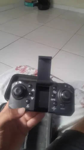 Drone com GPS Gn 512, Wi-fi, GPS, 2 baterias 20 minutos cadas, alcance de 100 metros,