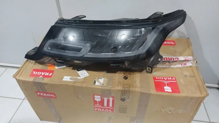 Farol Land Rover Sport