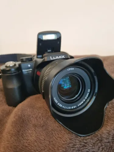 Maquina fotográfica Panasonic Lumix FZ-50 com flash externo
