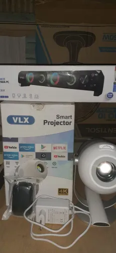 Projetor novo caixa de som Nova e um fone de ouvido de brinde