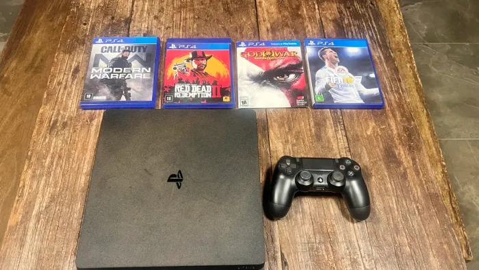 Ps4 + 2 controles + 4 jogos
