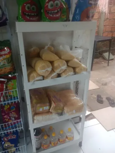 Vendo esse expositor apenas 1 mês de uso, interessados *