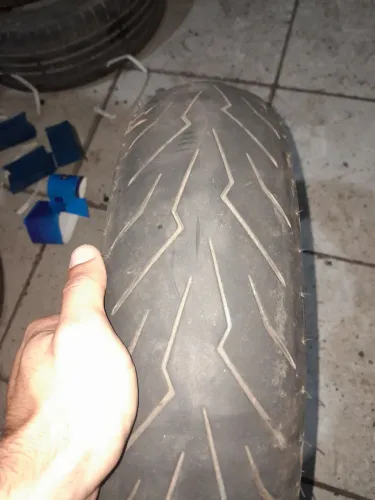 Pneu 110/70 R17 diablo rosso 3 meia vida