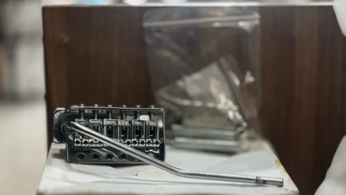 Escudo mais ponte guitarra