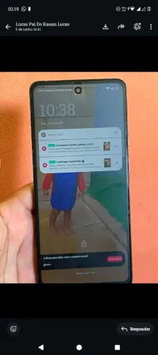 Vendo um Motog semi novo de 125g em perfeito estado na caixa imagem perfeita