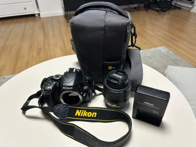 Máquina fotográfica Nikon D5100 + Lente Nikkor AF-S 18-55 mm + Case - 10.400 cliques