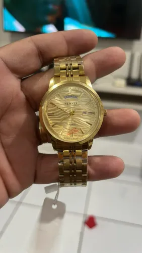 Relógio newrex!