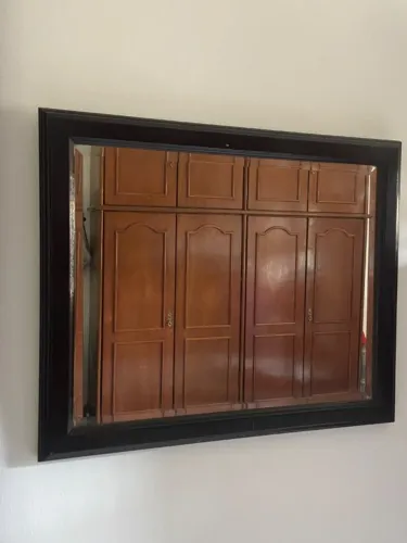 Espelho antigo em cristal com moldura em mogno
