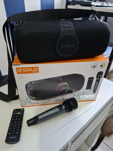Caixa de Som A?Gold SM 32, com microfone e controle remoto.