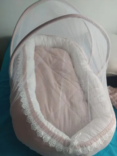 Ninho para bebê com mosquiteiro