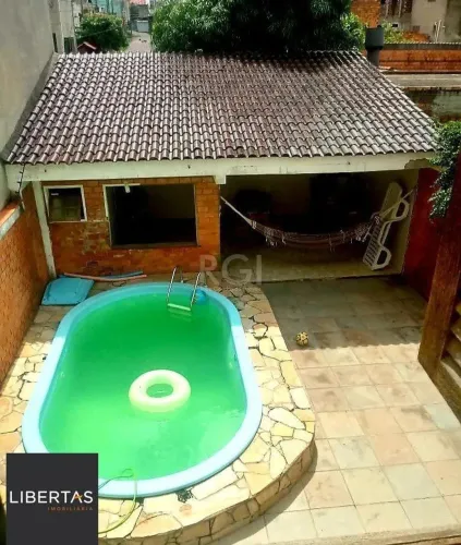 Casa com piscina 3 dormitórios e 2 Costa e Silva Zona Norte de Porto Alegre