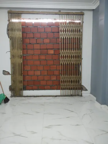 Grade Sanfonada Cor Ouro