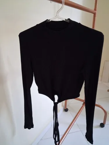 Camiseta da marca Colcci